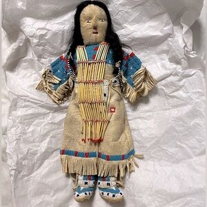 Vintage Native American child’s doll handcrafted with Beaded Dress